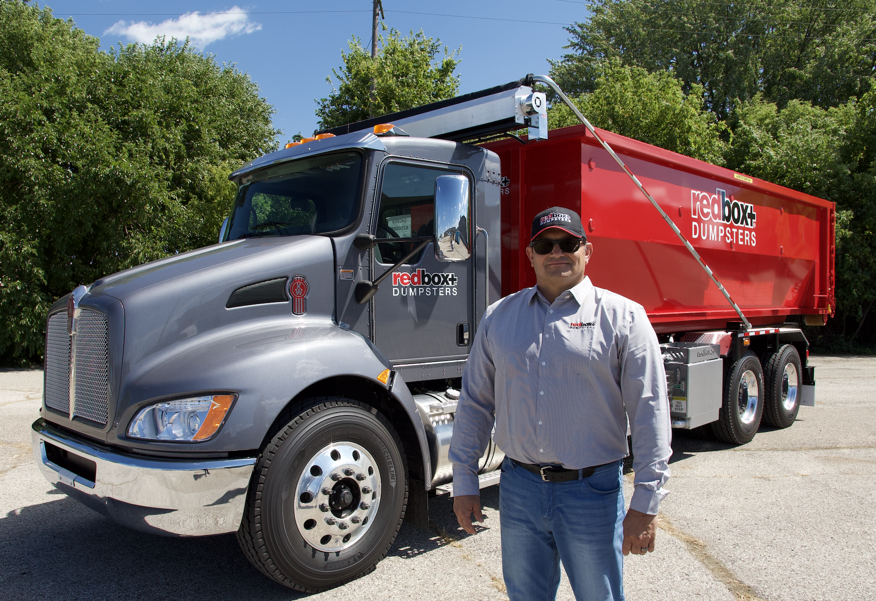 be your own boss redbox+ employee in front of truck